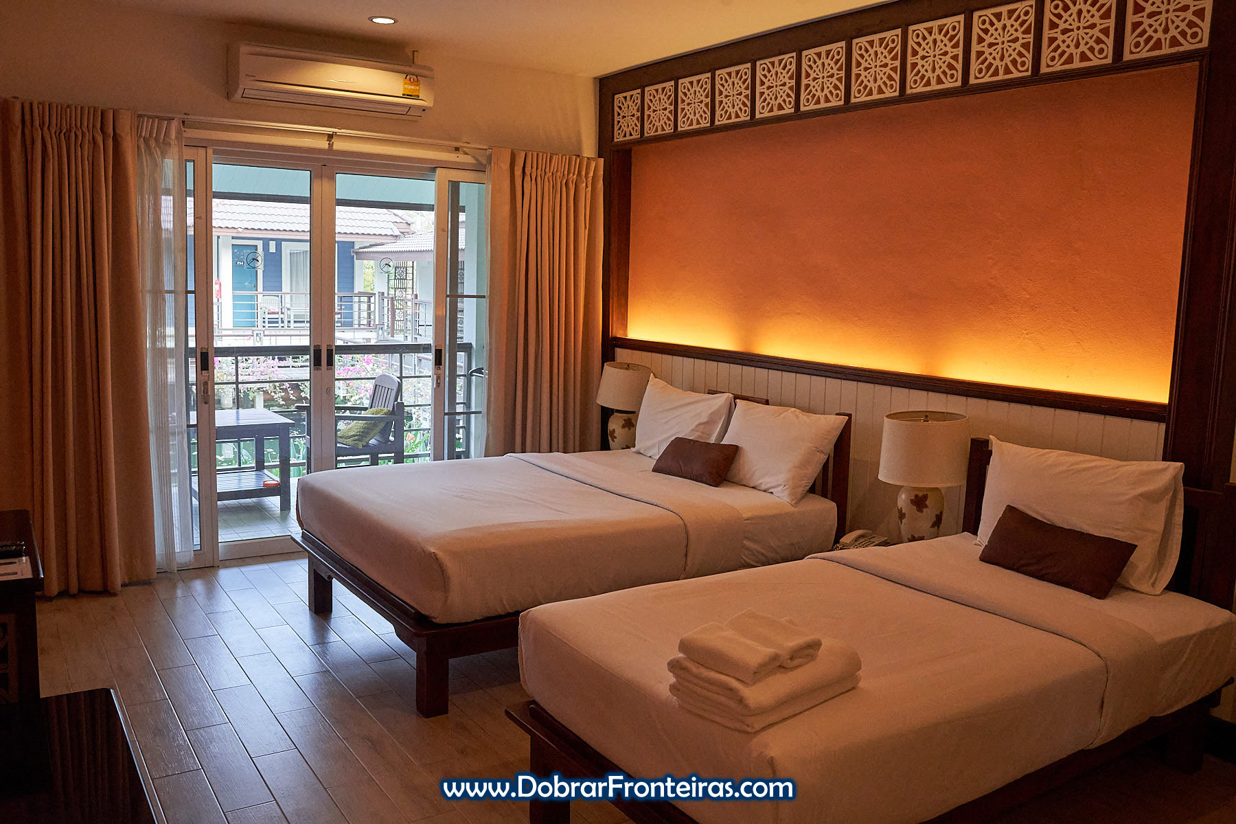 quarto de hotel Le Charme Sukhothai